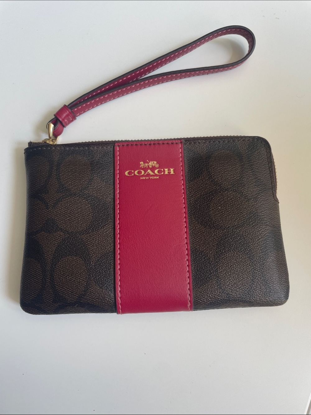 Coach Brown Signature Wristlet with Pink Center Stripe